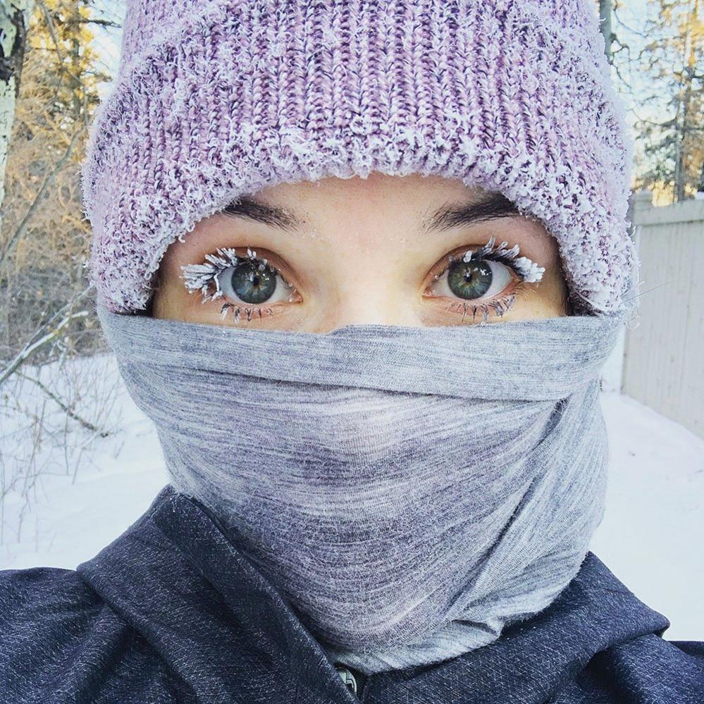 Woman with frozen eyelashes