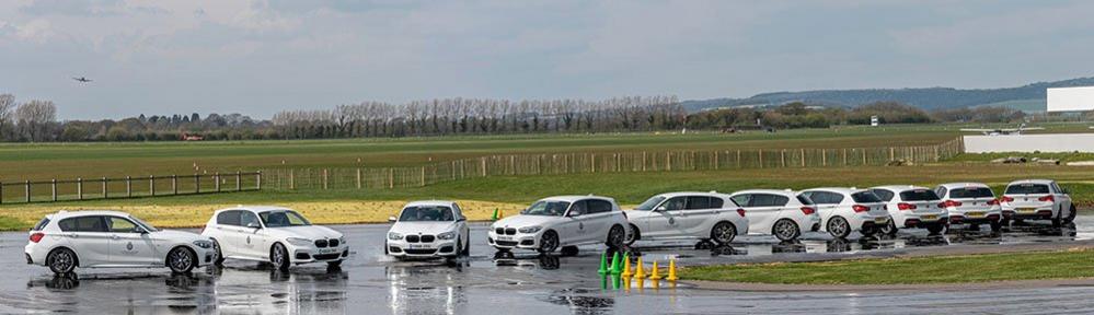 Composite image of a car on a skid pan