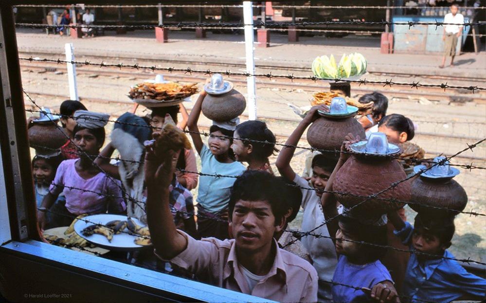 People selling tea at the train window, 1982