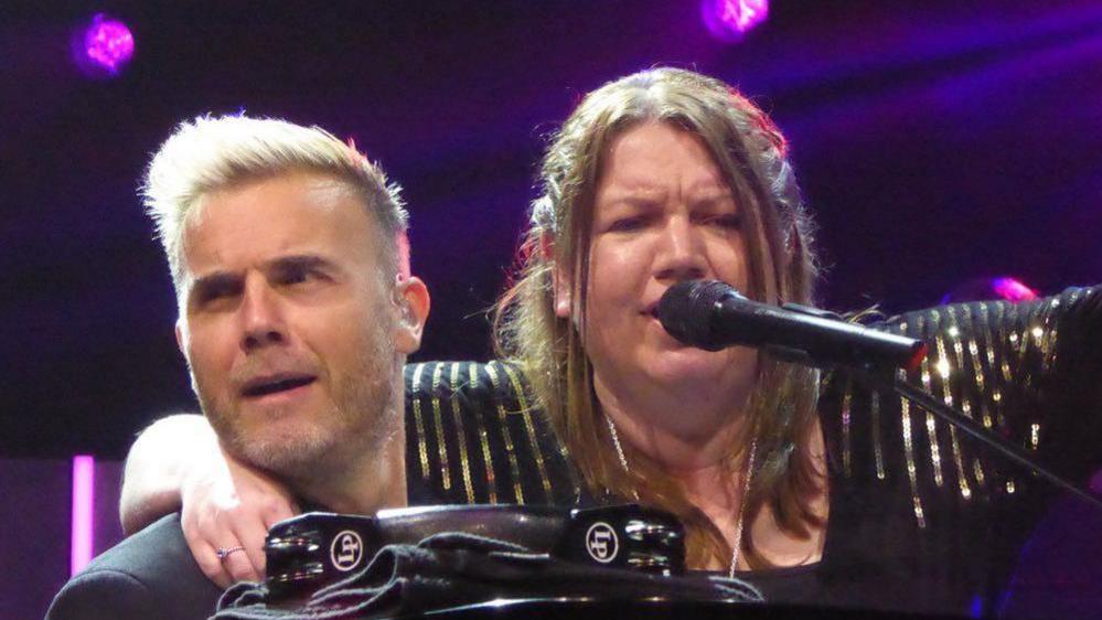 Take That fan Emma Knaggs with Gary Barlow 