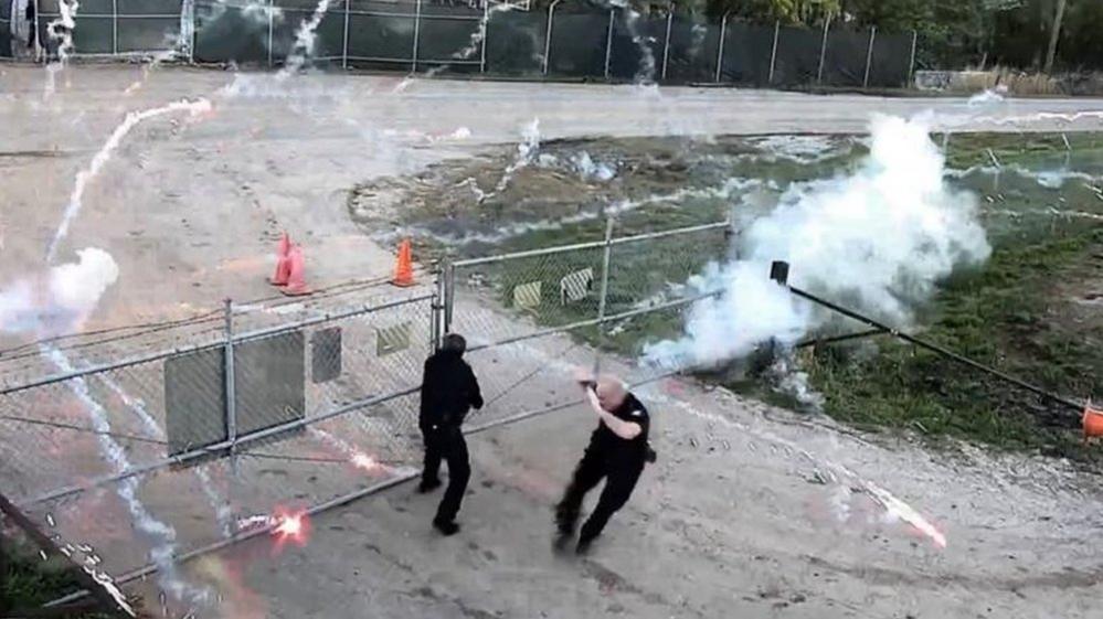 Fireworks exploding near officers