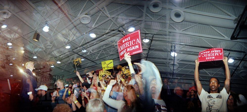 The crowd cheers as Donald Trump walks on stage at his rally in Ambridge, Pennsylvania, 10 October 2016