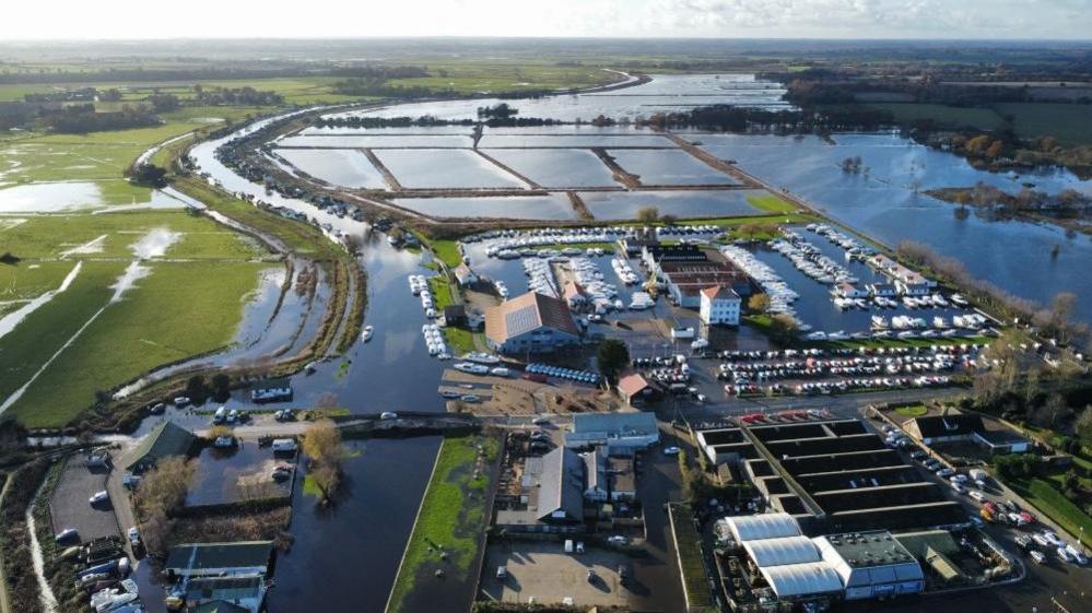 Aerial picture of Potter Heigham surrounded by flood water.