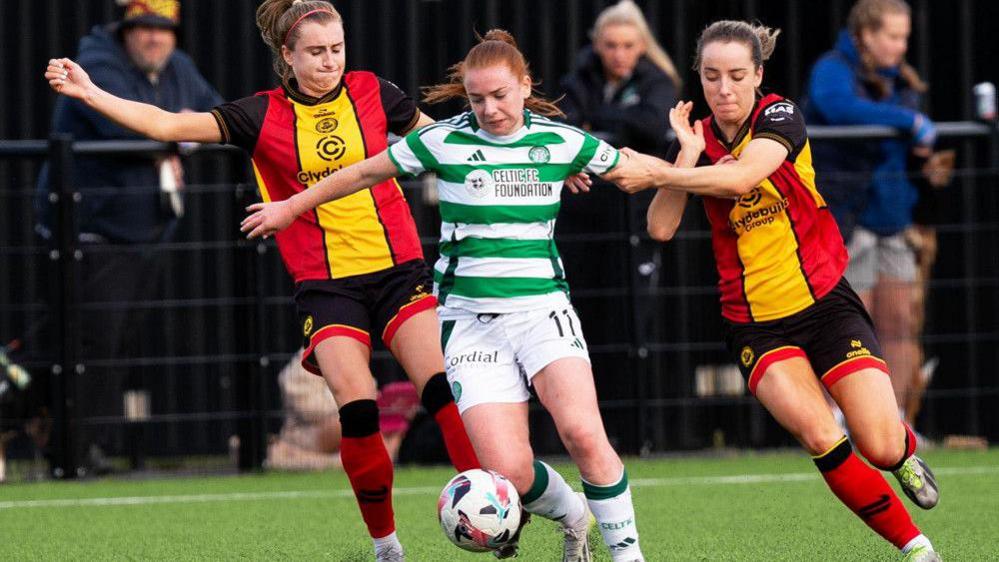 Colette Cavanagh battles through the Partick Thistle defence.