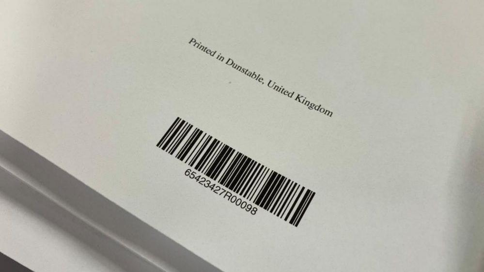 A bar code on the back of a book, showing where it is printed. The book is on white paper and has "Printed in Dunstable, United Kingdom" written on the back.