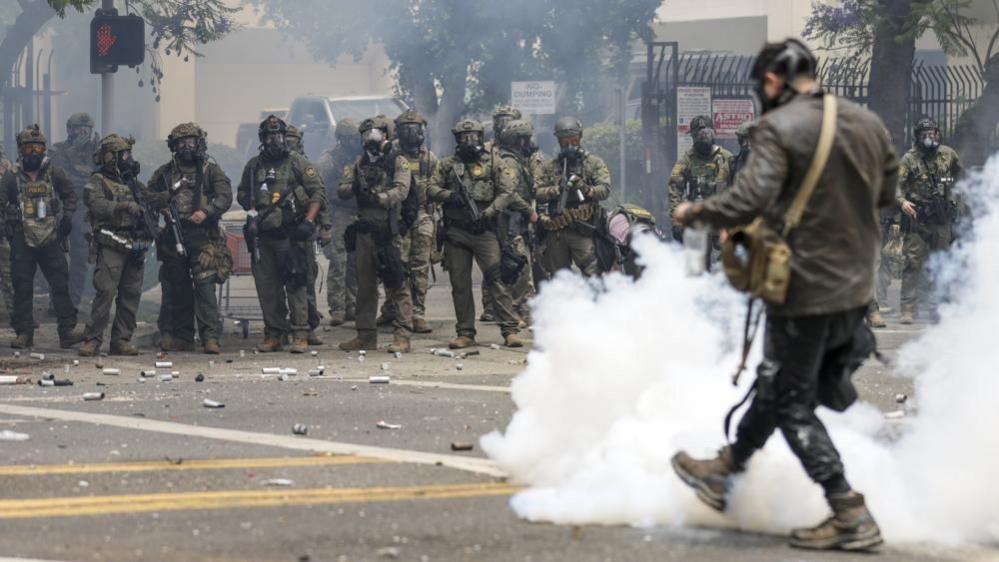 US federal agents fire smoke grenades at protesters in Los Angeles' suburb of Paramount, California. Photo: 7 June 2025