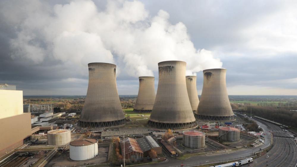 Large power plant with five chimneys