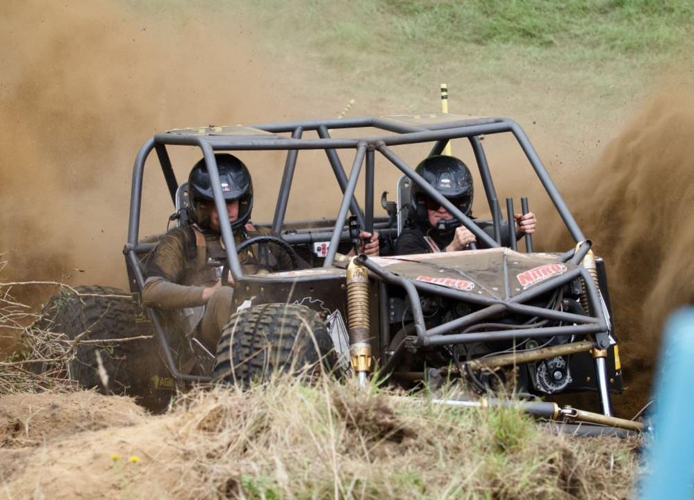 A car racing on a dirt track