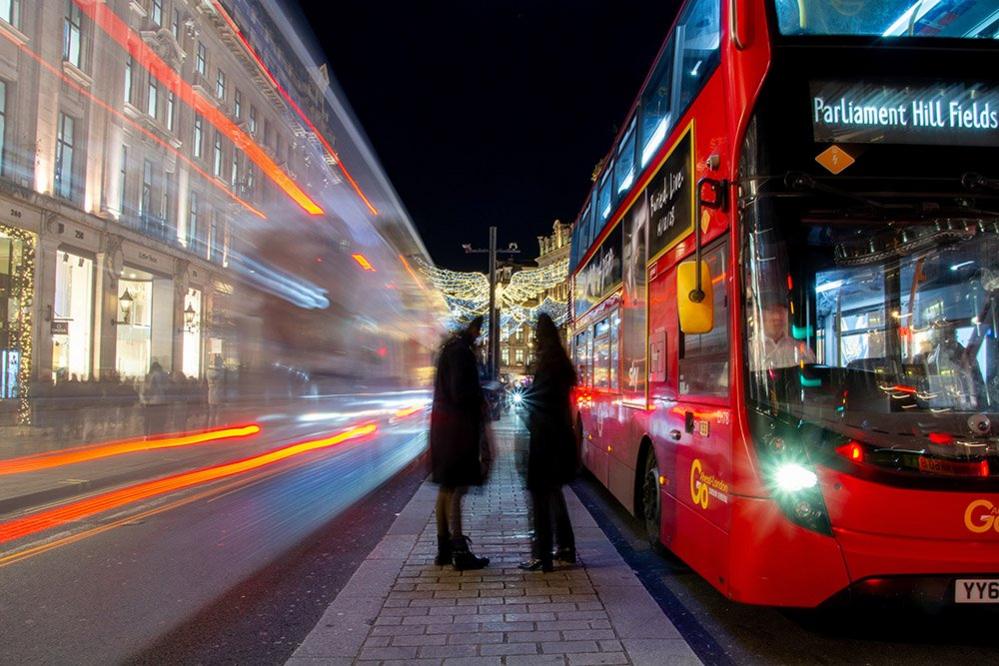 A bus and pedestrians on Oxford Street in London