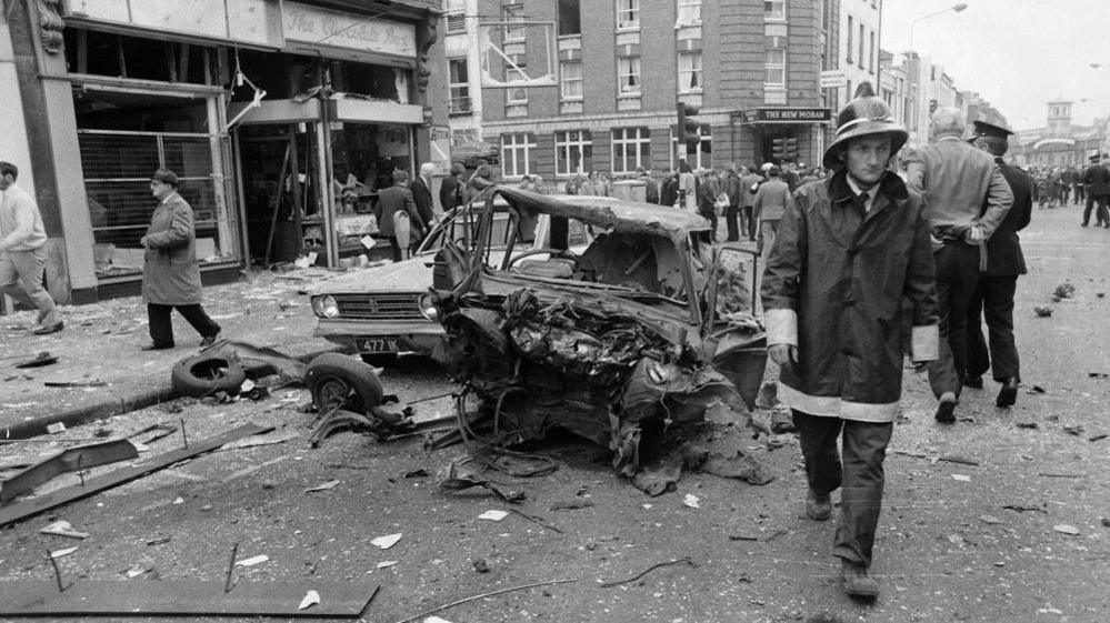 The wreck of a car following the bomb in Talbot Street, Dublin, in 1974