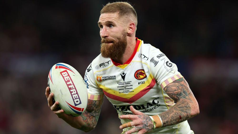 Sam Tomkins playing rugby league