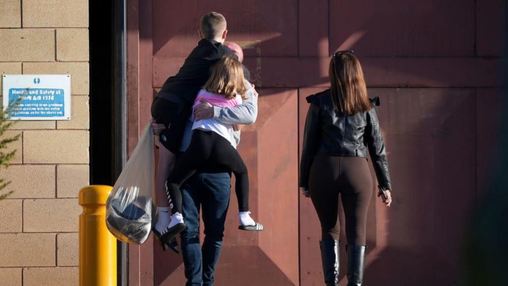 People seen outside HM Prison Swaleside on the Isle of Sheppey, Kent