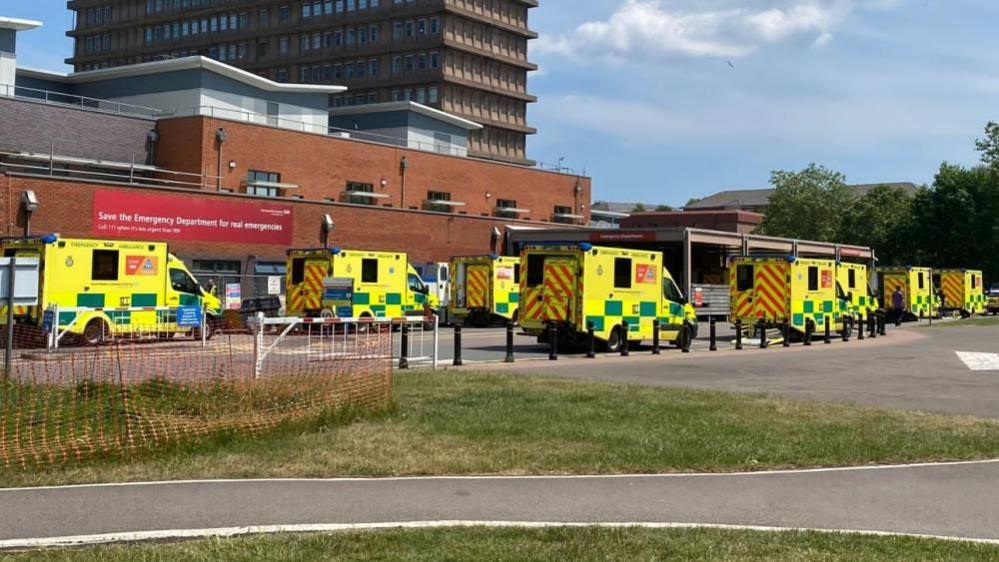 Ambulances line up outside Gloucestershire Royal Hospital.