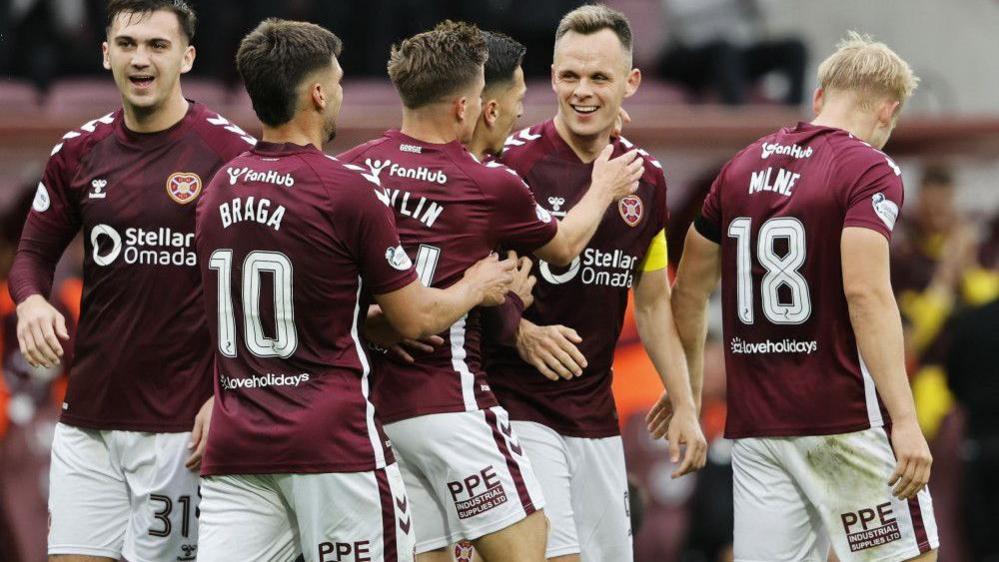 Shankland celebrates with his team-mates after making it 2-0