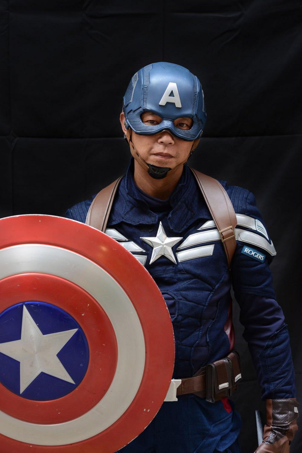 A protester poses for a portrait during the Anti-Totalitarianism march in Causeway Bay, Hong Kong, 29 September 2019