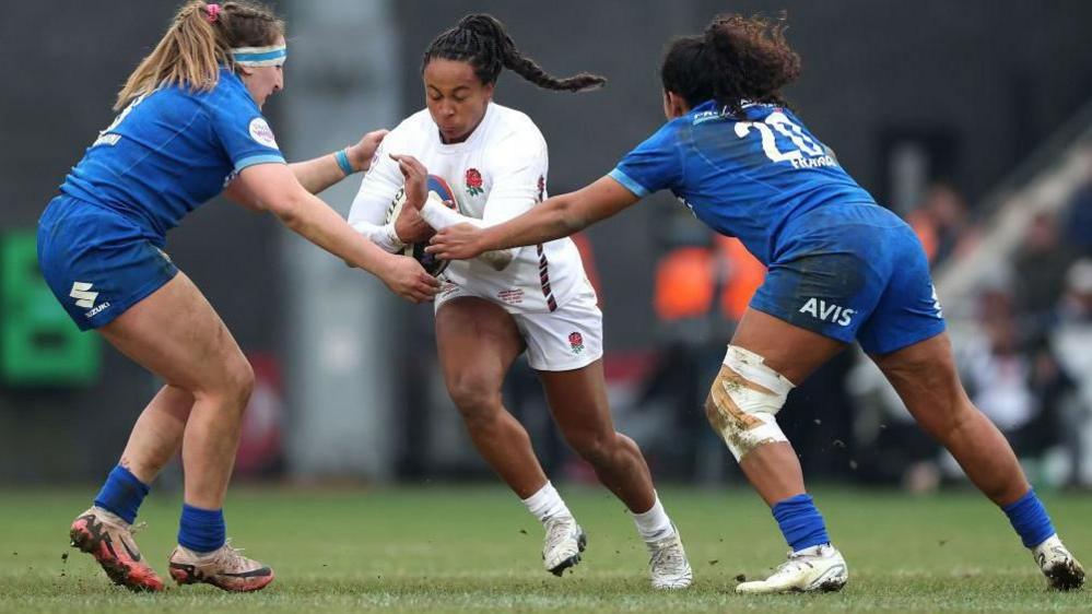 Jade Shekells carries the ball against Italy