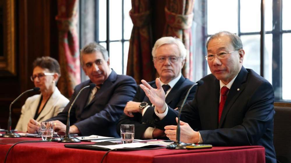 British physician Neena Modi, human rights barrister Mark McDonald, Conservative MP David Davis and Professor Dr Shoo Lee speaking at a press conference