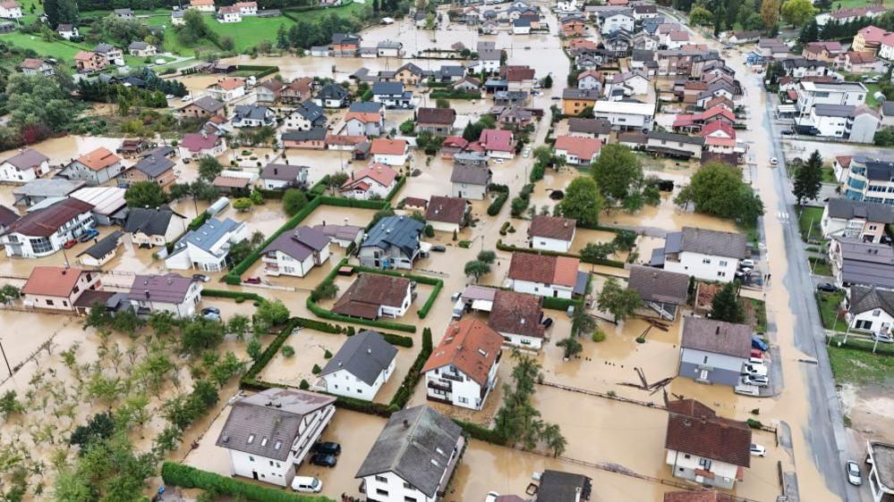 A drone view shows a flooded residential area in Kiseljak, Bosnia and Herzegovina