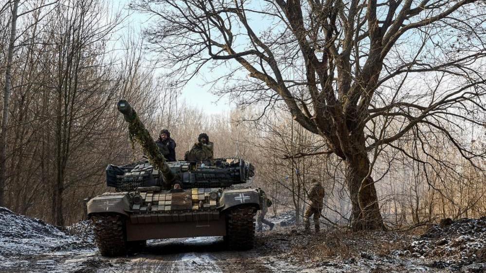 Servicemen of the 3rd Separate Tank Brigade of the Ground Forces of Ukraine operate a tank near the frontline