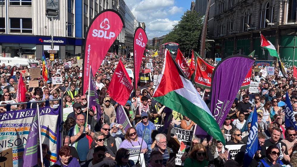 Crowds of campaigners lining the street in front of Belfast City Hall 