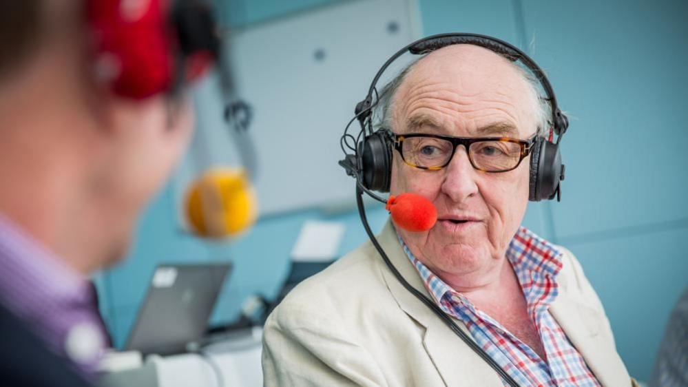 Henry Blofeld in the commentary box in 2013