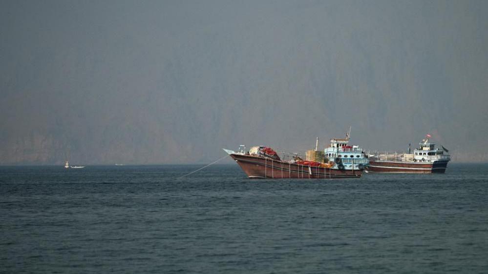 Two vessels at the Strait of Hormuz, taken from Musandam, Oman