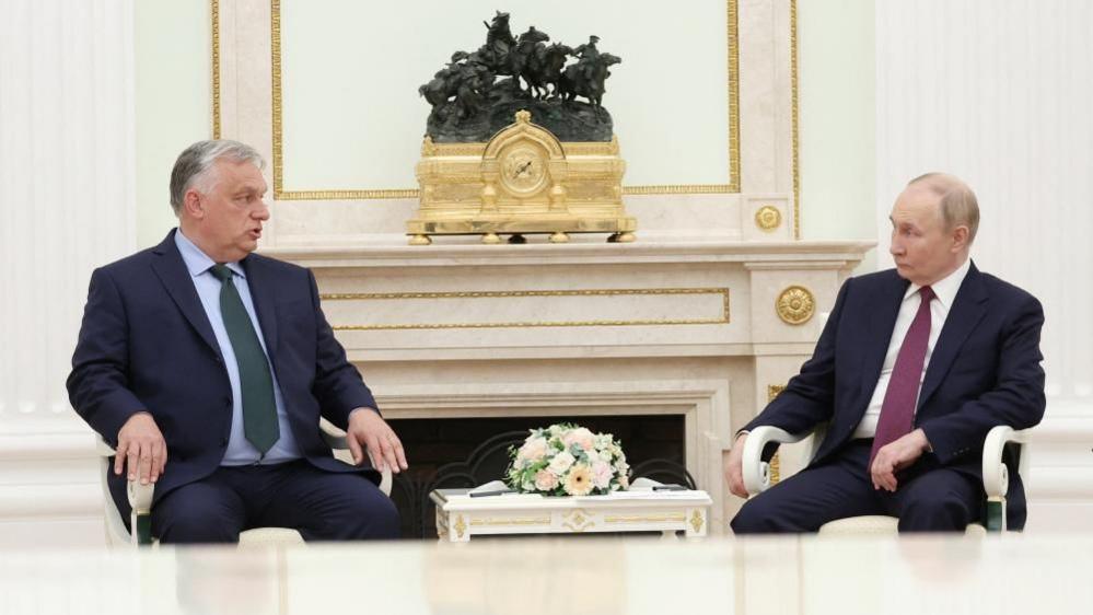 File image of Viktor Orban and Vladimir Putin talking during a meeting