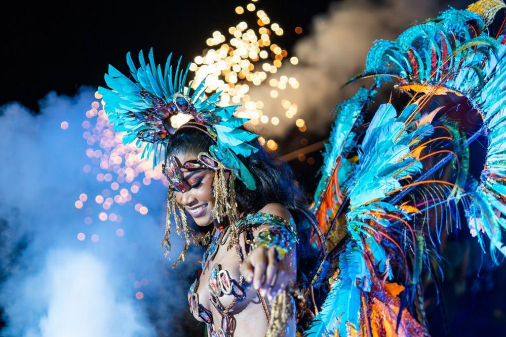 A woman wearing a elaborate costume at Trinidad's carnival