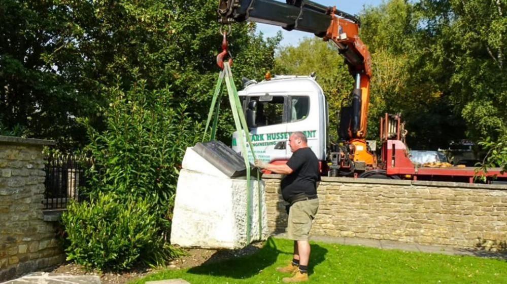 A war memorial in Melksham is moved after falling into disrepair