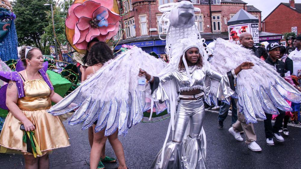 People in costumes at the West Indian Carnival