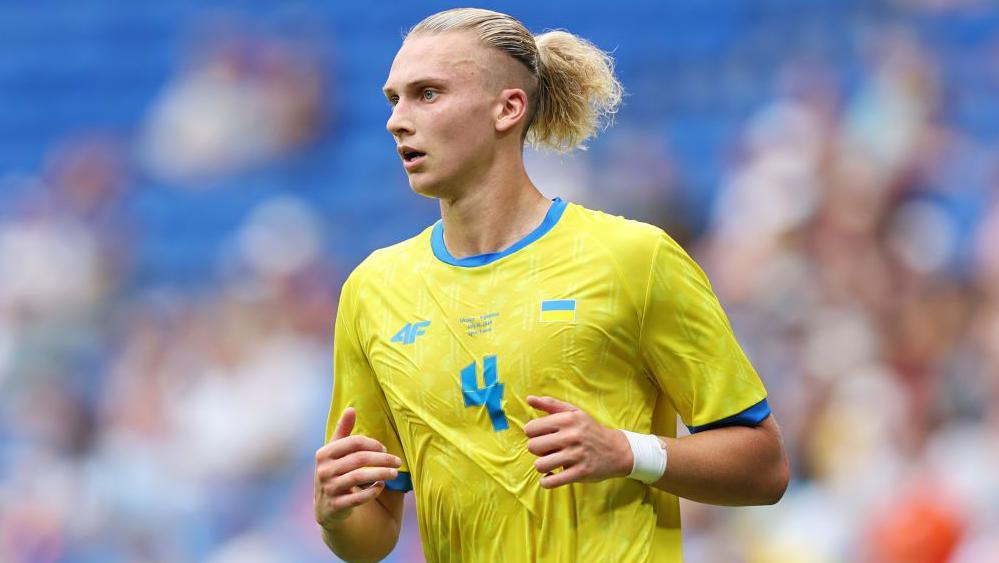 Maksym Talovierov in action for Ukraine