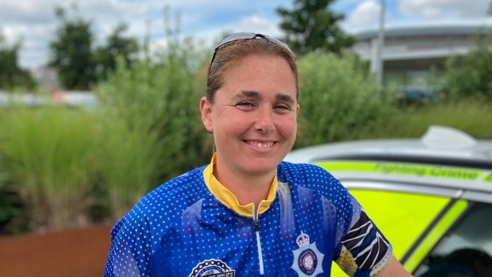 PC Lucy Sculthorpe with short fair hair wearing a blue top