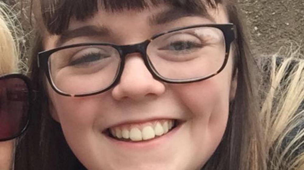 A close-up image of Manchester Arena bomb victim Georgina Callender. In the photograph, the dark-haired teenager smiles at the camera.