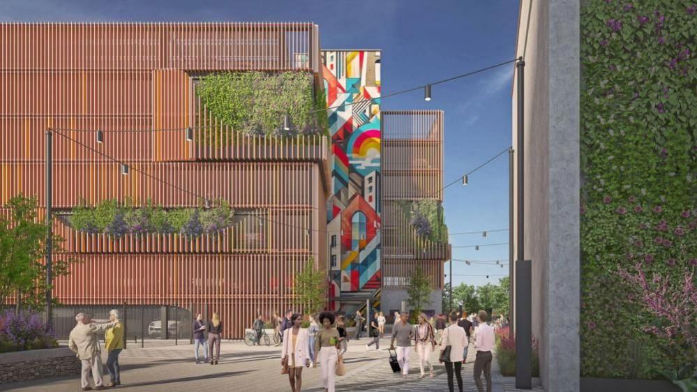 An artist's impression of plans for a new transport hub at Bristol Temple Meads Station. It is a large brown building with a colourful mural on one part of it. People can be seen walking in front of it.