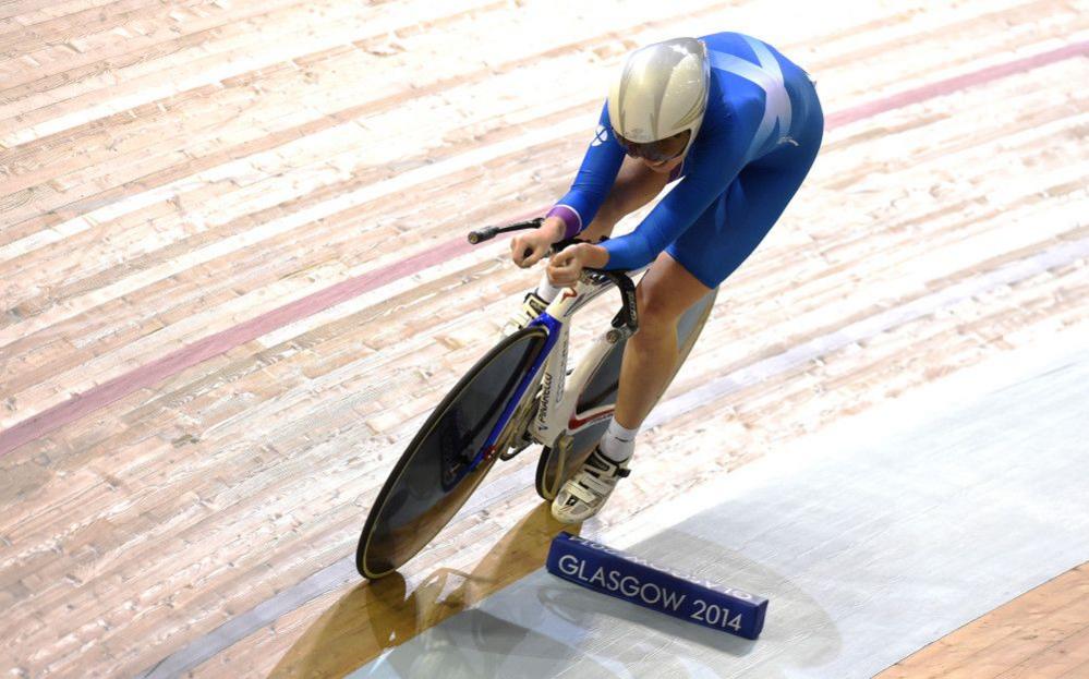 Katie Archibald cycling on the track at the Glasgow Commonwealth Games in 2014.