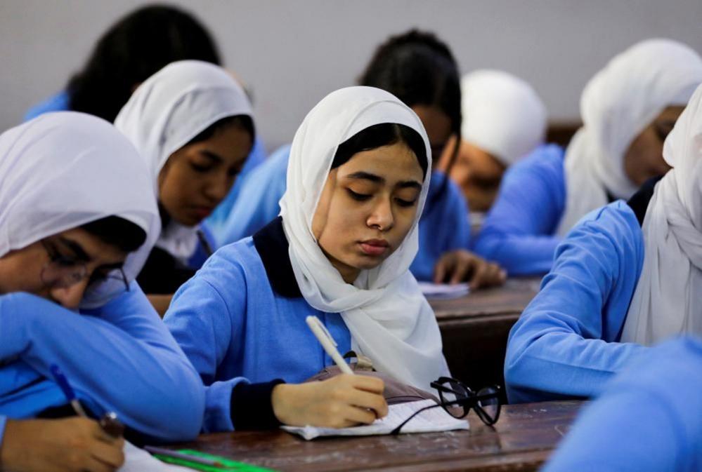 Students attend a class on the first day of the academic year at Orman school, in Cairo, Egypt, September 22, 2024. 