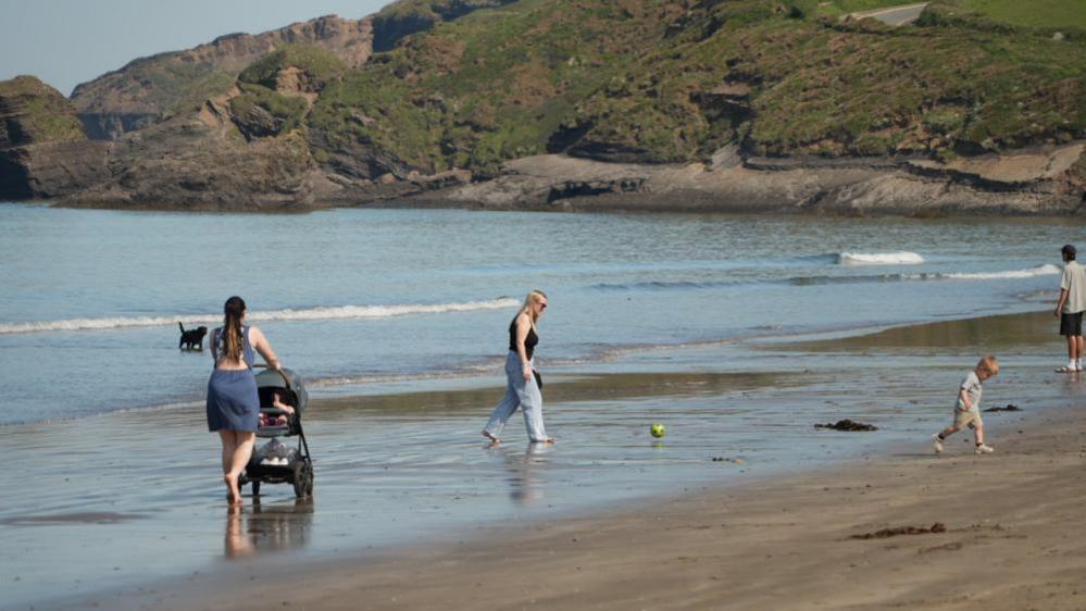 A group of people on a sunny beach