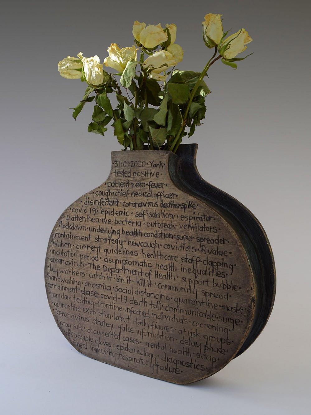 Vase made using sgraffito technique