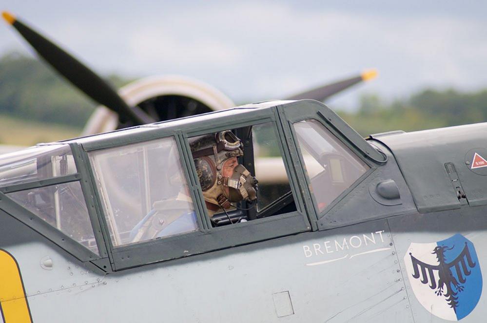 Pilot in an old military fighter aircraft