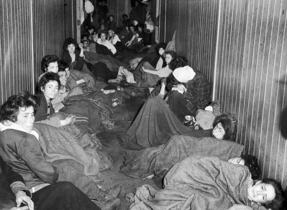 Women lying in hut at Belsen