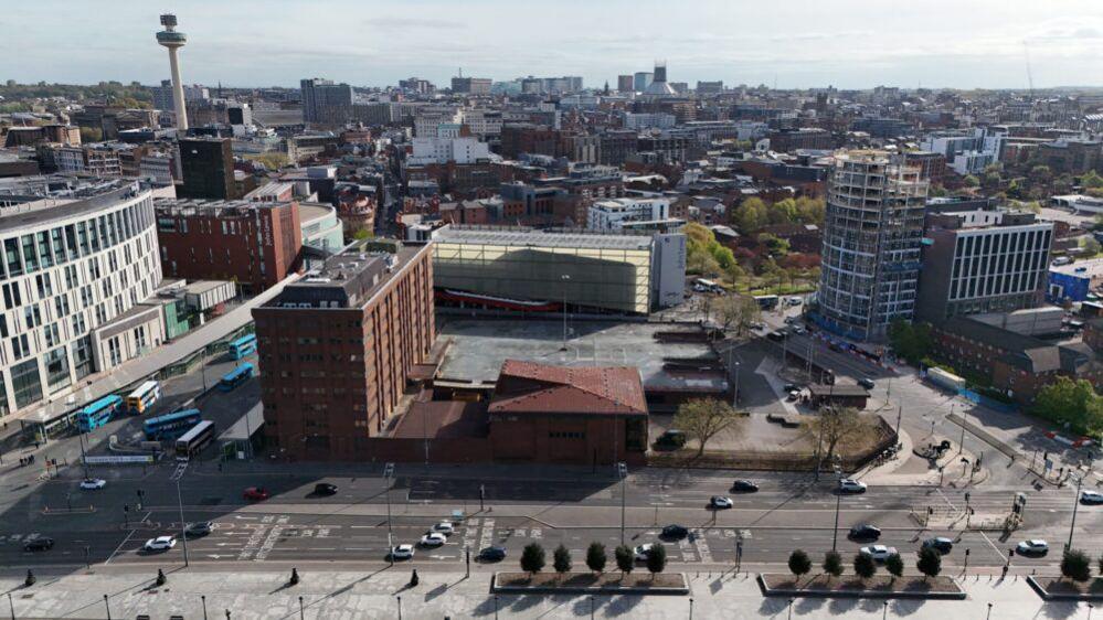 An aerial shot of Canning Place in Liverpool, the Radio City Tower can be seen in the background and Liverpool ONE to the left of the building and the Baltic Triangle to the right