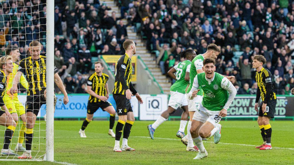 Nector Triantis celebrates the game's opening goal