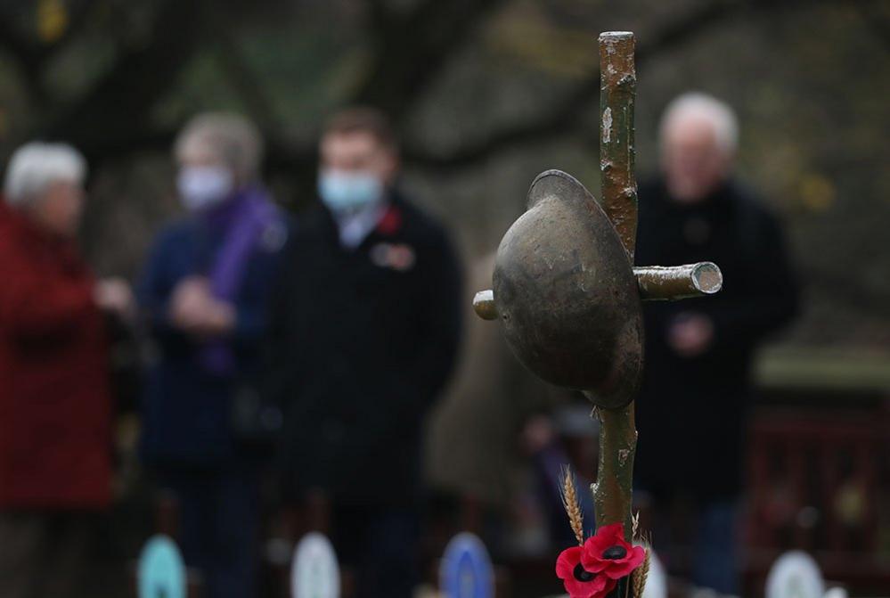 A helmet on a grave