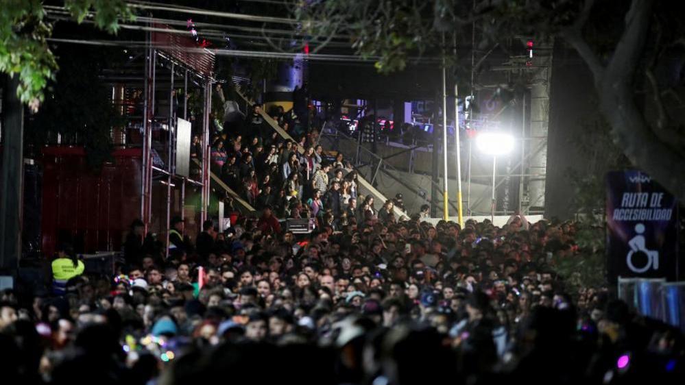 People leave the amphitheatre of the International Song Festival after the suspension of the performance during a blackout in Vina del Mar, Chile, February 25, 2025.