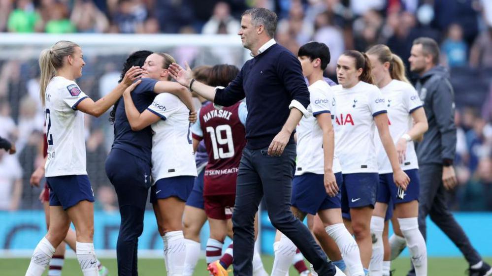 Tottenham manager Robert Vilahamn celebrates with his players