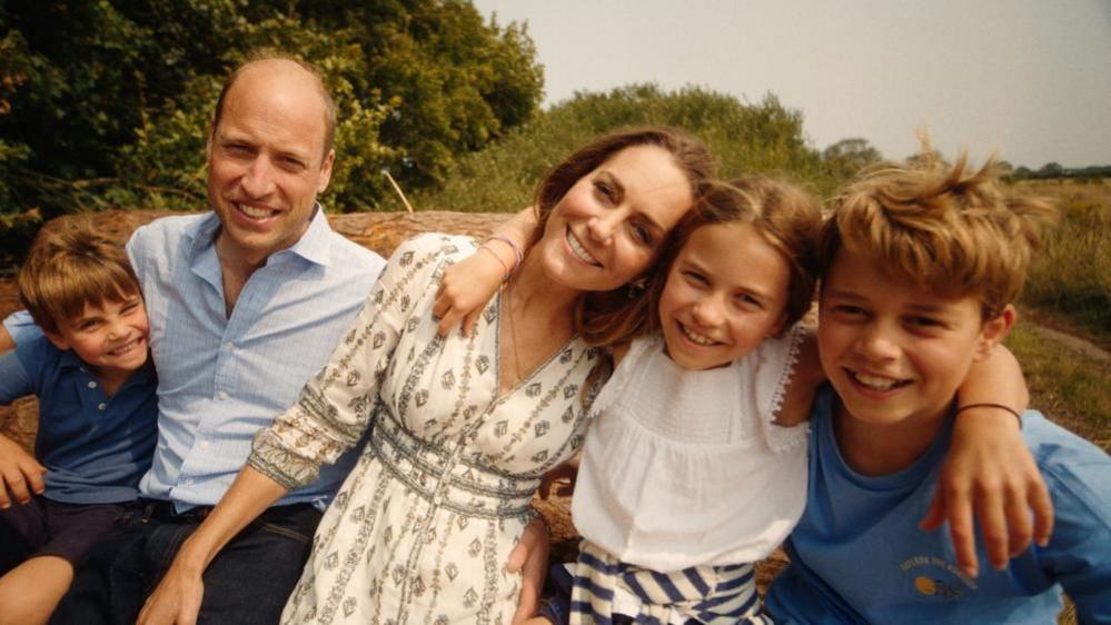 Prince Louis, Princess Charlotte and Prince George with their parents the Prince and Princess of Wales