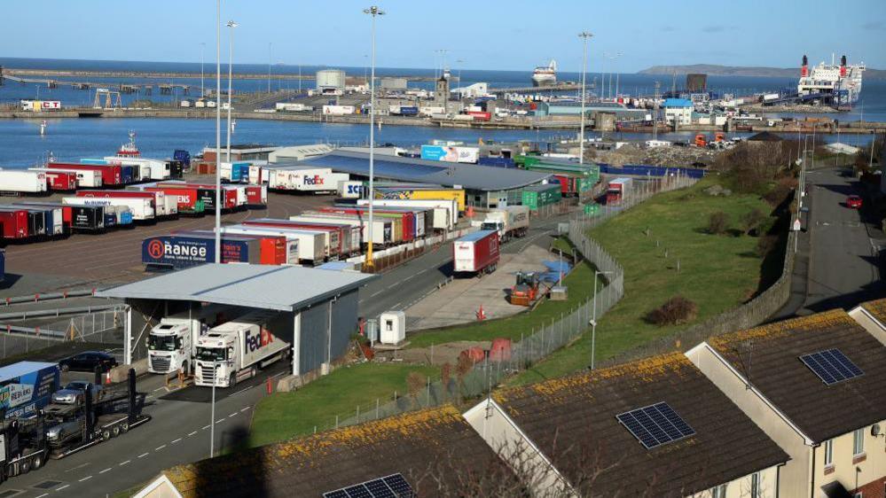 Lorries disembark from a Stena Line ferry recently arrived from Dublin at the Port of Holyhead