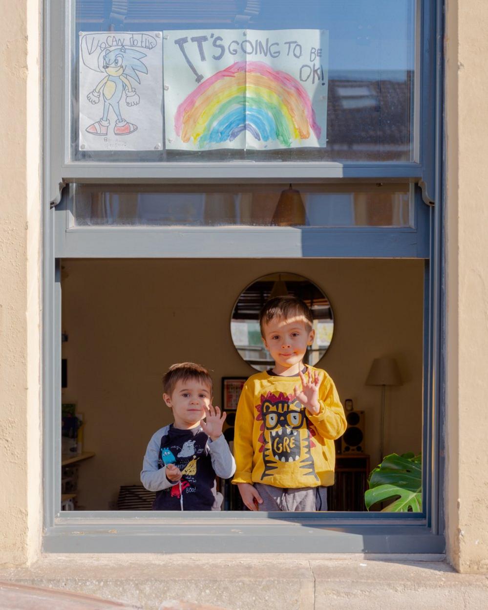 Remy and Etienne at the window