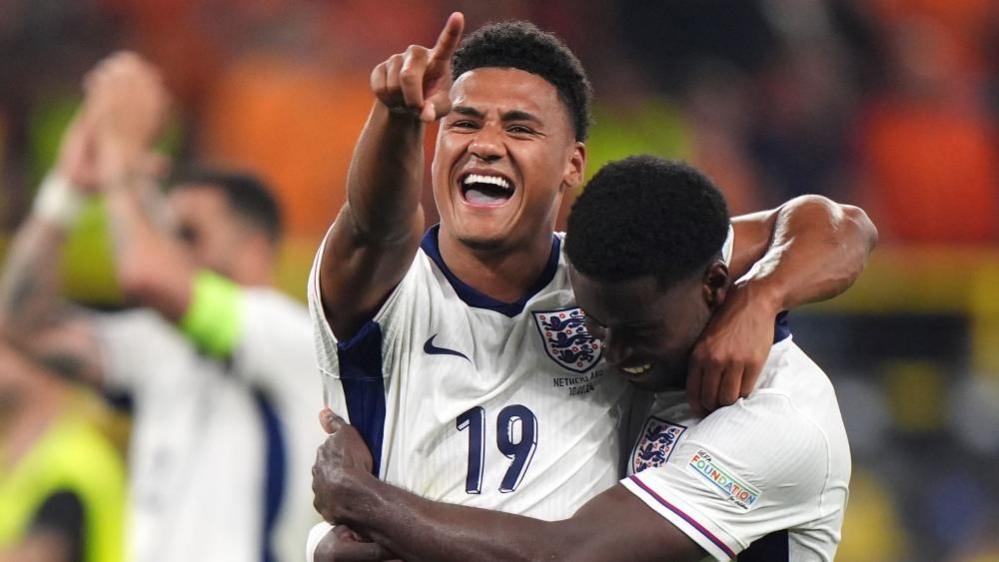 Ollie Watkins celebrates his England goal with team-mate Marc Guehi