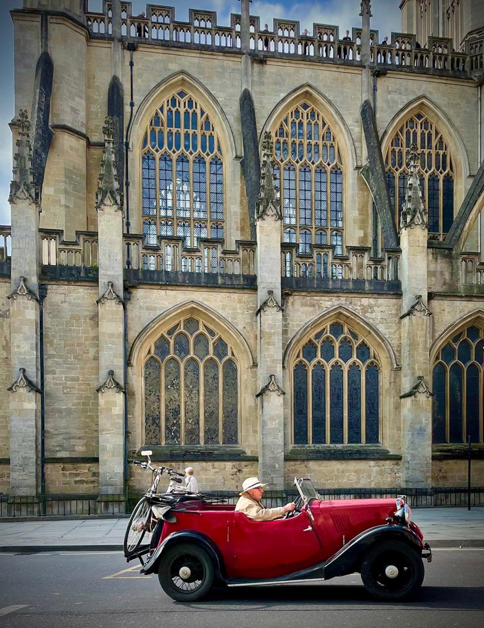 Man driving a classic car